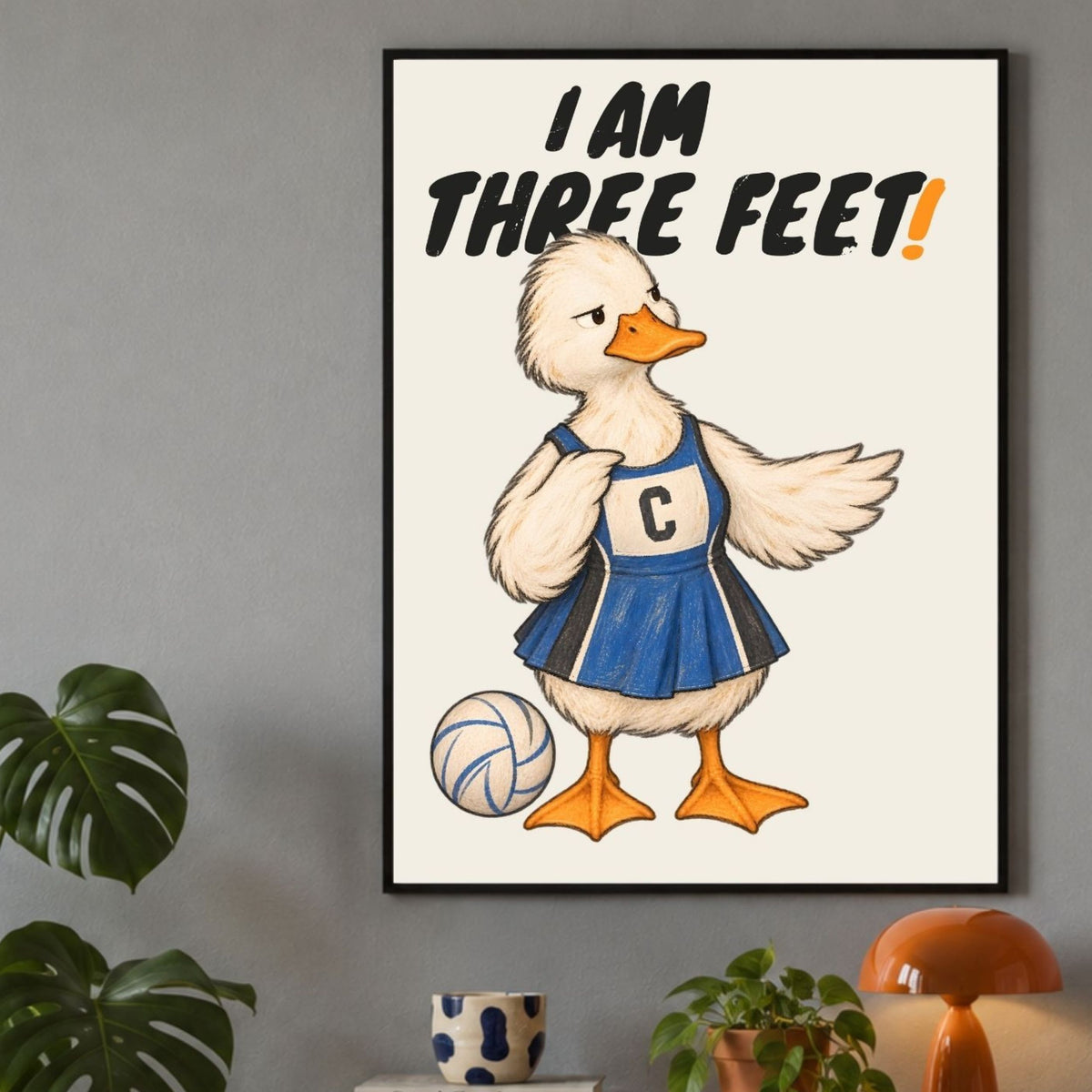 Close-up framed I AM THREE FEET netball print with deadpan duck