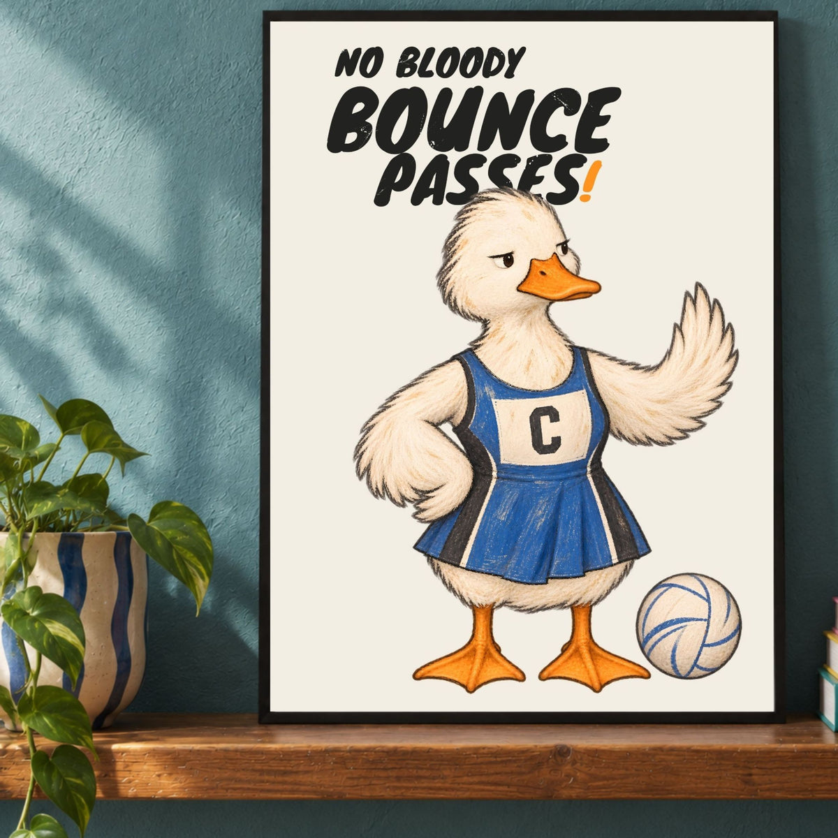 Framed netball wall art close-up with NO BLOODY BOUNCE PASSES artwork
