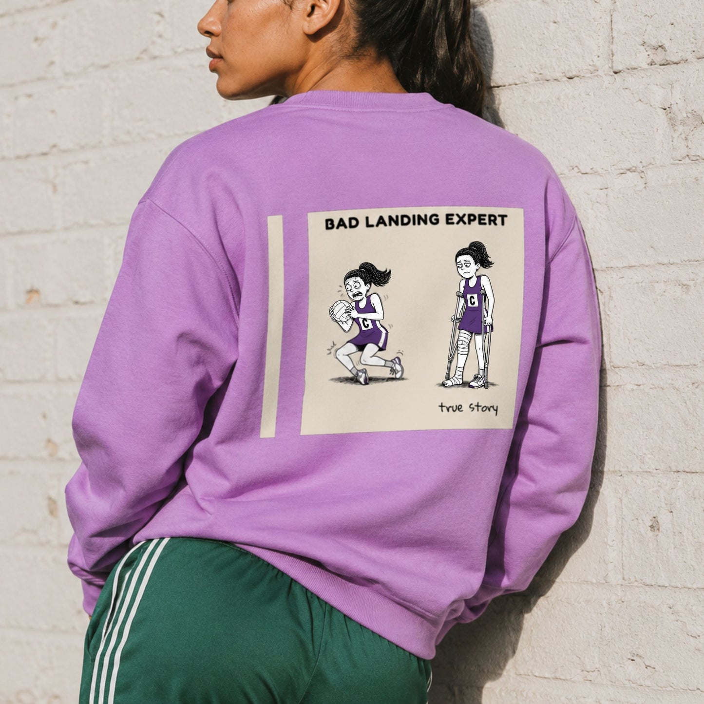 Women's Netball Sweatshirt with Funny Bad Landing Expert Cartoon Print