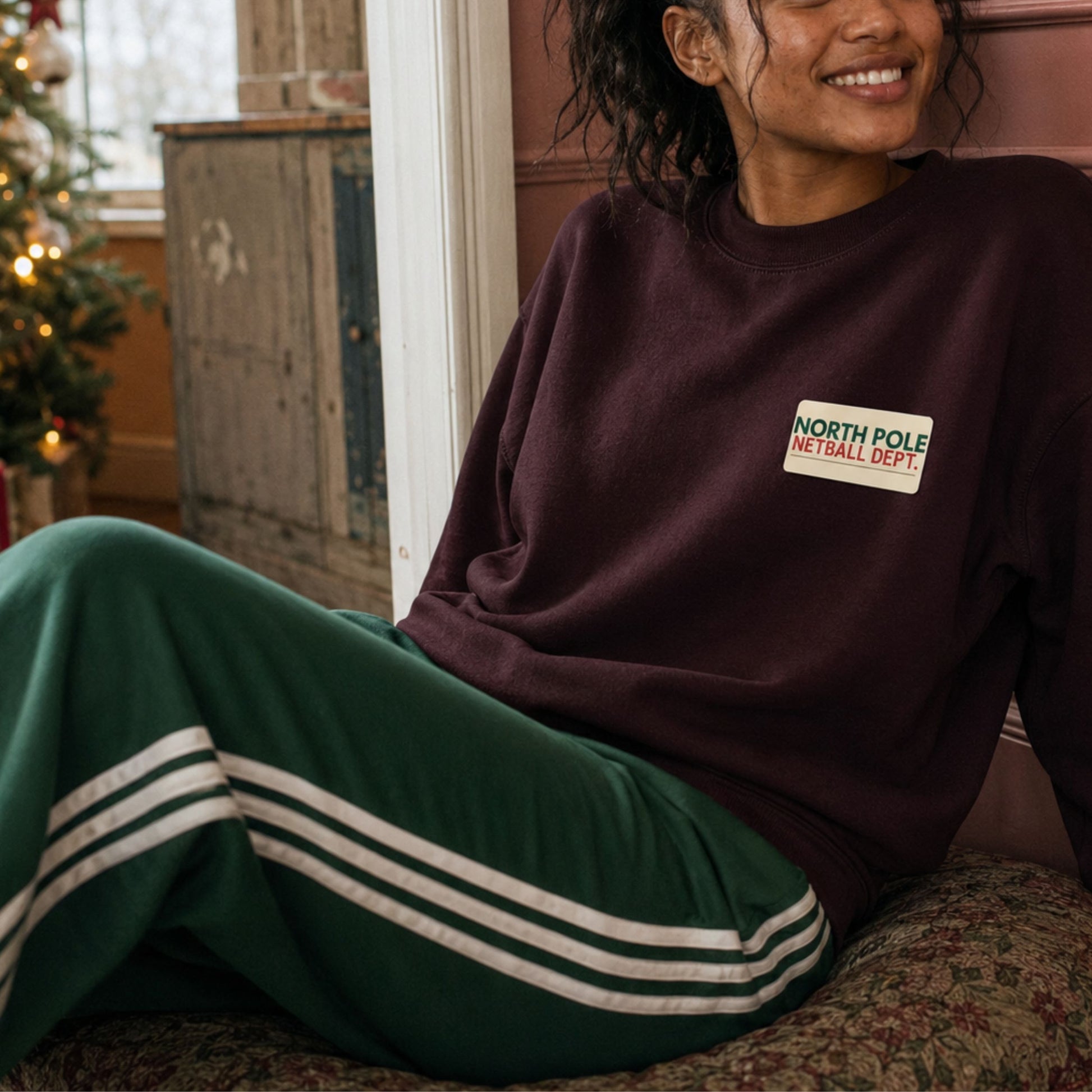 Netball Player Christmas Sweater with North Pole Graphic