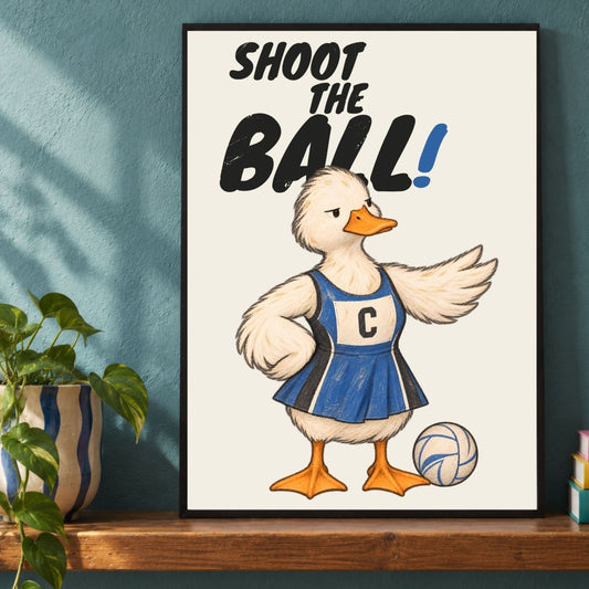 Close-up framed SHOOT THE BALL netball print with duck illustration