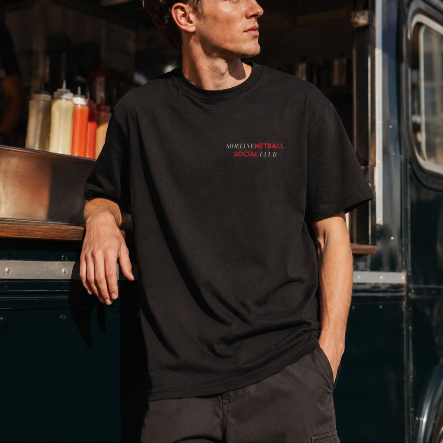 Black Sideline Netball Social Club Graphic Tee